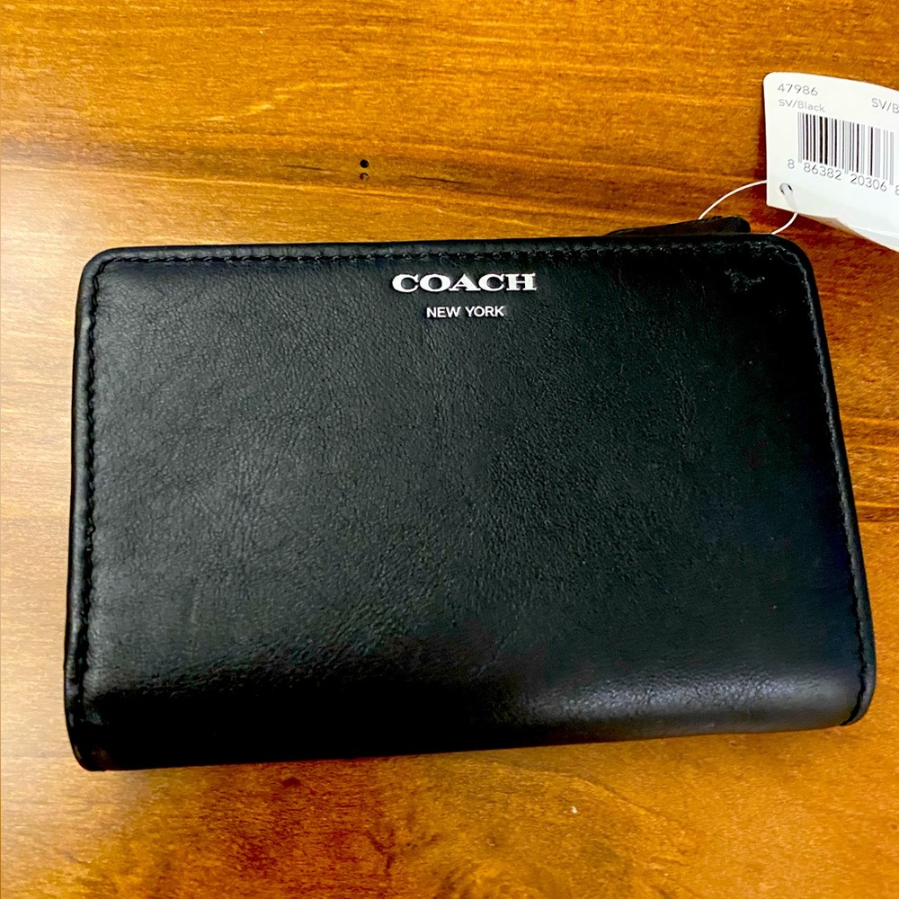 Brand new, never used with tag Black Coach wallet